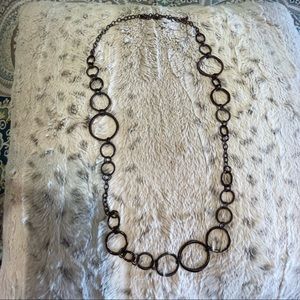 Lia Sophia long bronzed tone textured circles necklace